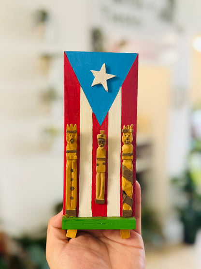 Reyes tallados sobre bandera PR